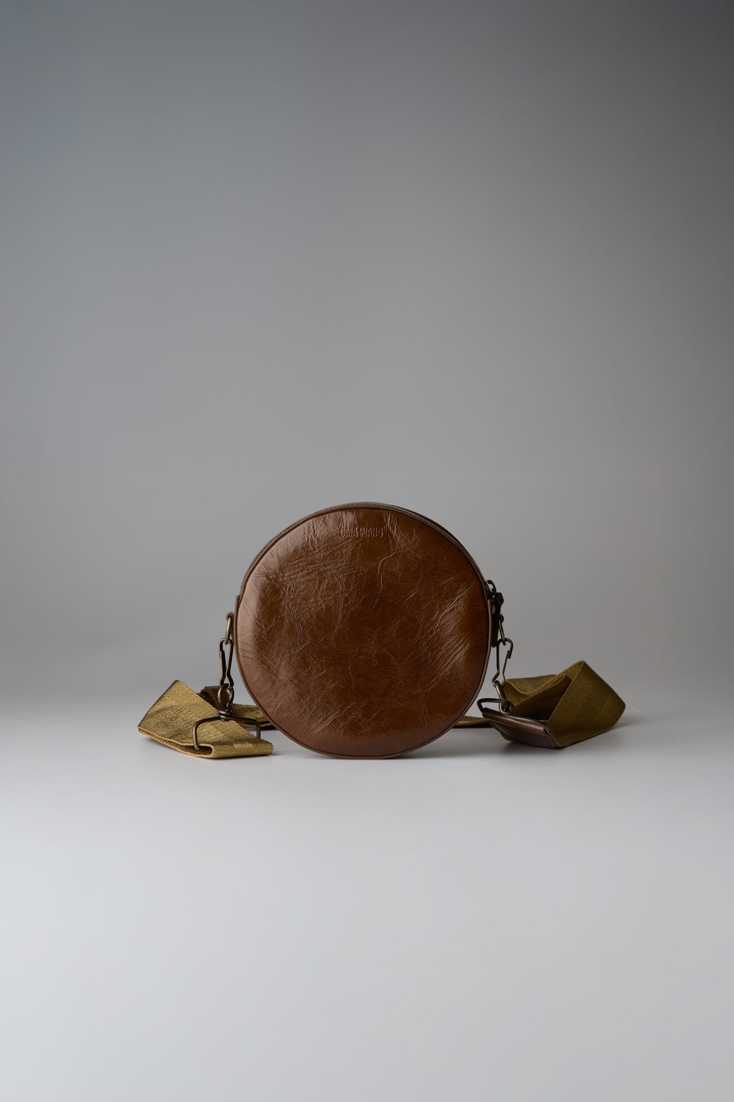 ROUND SMALL CLUTCH
