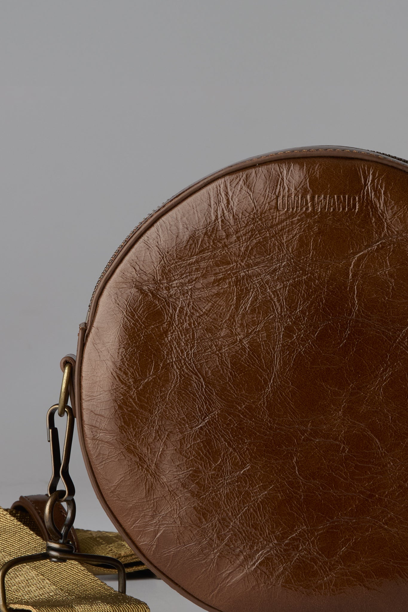 ROUND SMALL CLUTCH
