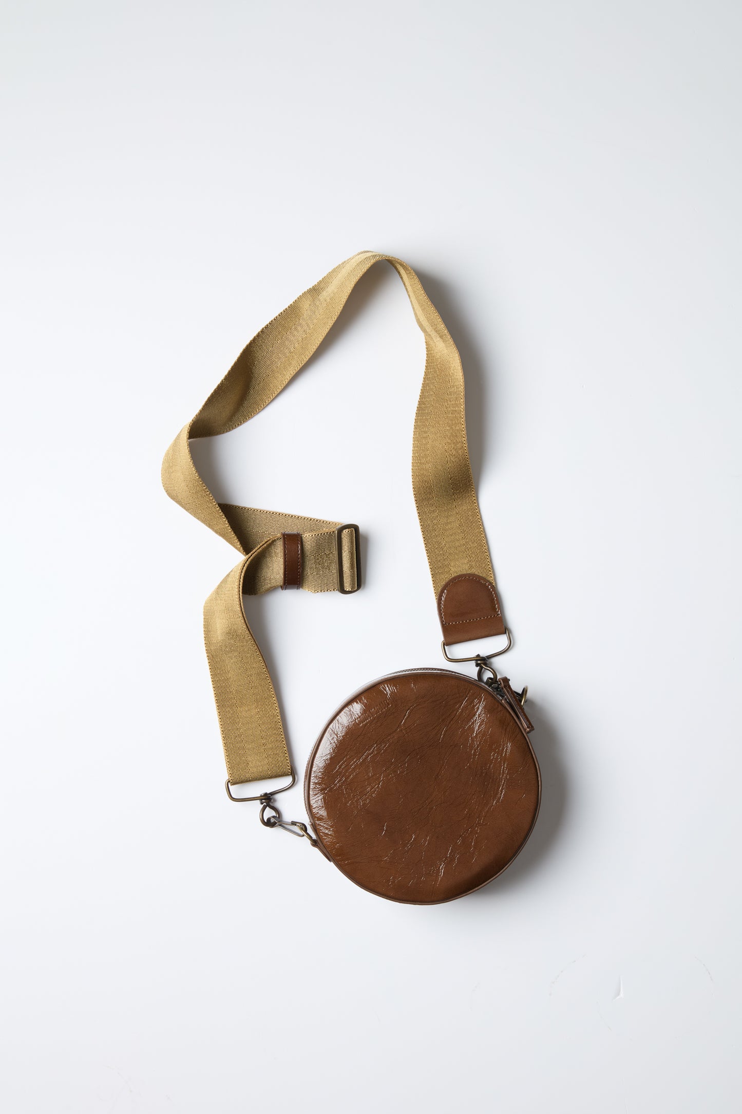 ROUND SMALL CLUTCH