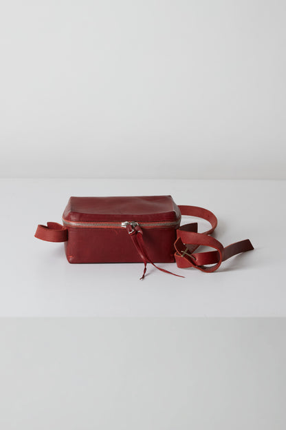 SMALL ZIPPED BRIEF CASE LONG STRAP