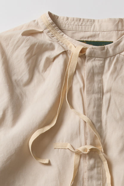 SHIRT WITH RIBBONS