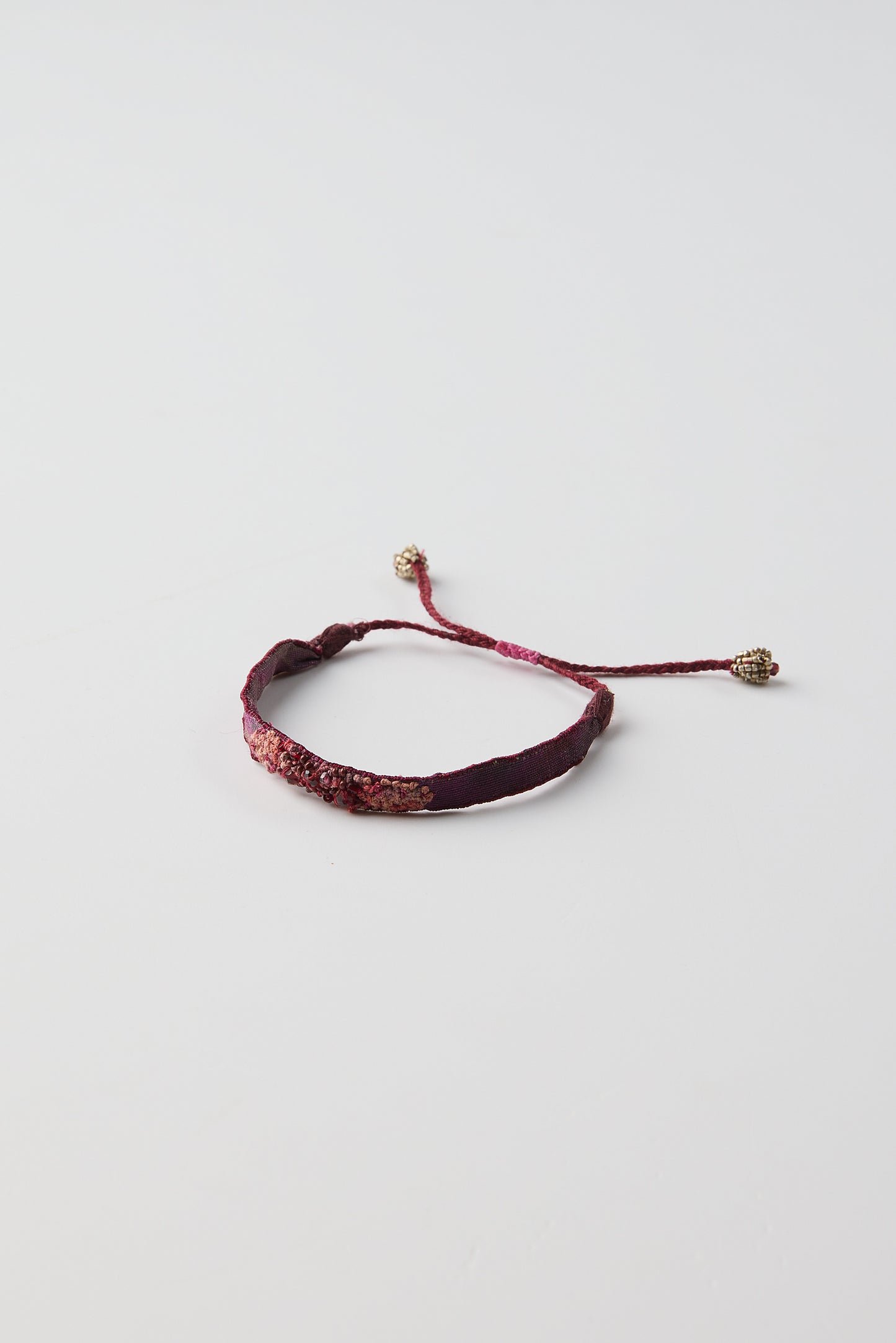 PURPLE BEAD BRACELET