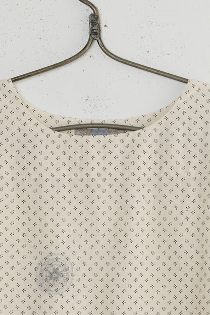ROOT SLEEVELESS BLOUSE