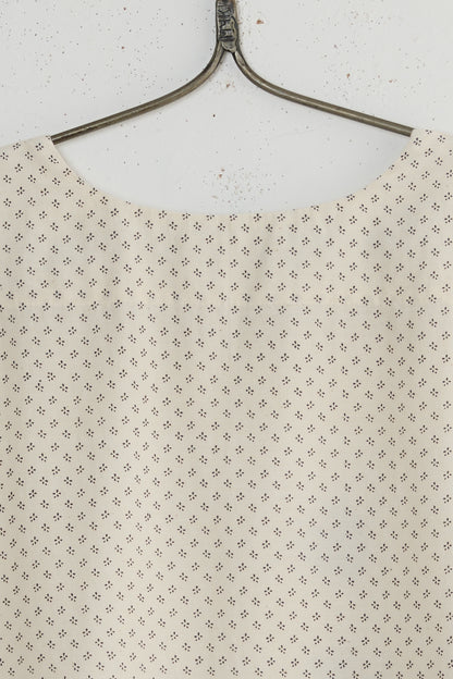 ROOT SLEEVELESS BLOUSE
